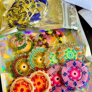 Hand beaded earrings and hoops. Custom ordering coming soon!